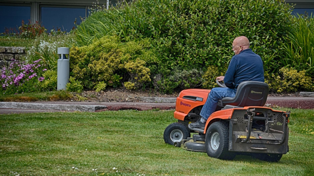 man on a riding mower